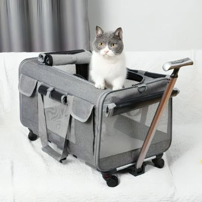 Sac transport chat trolley gris posé au sol avec sa poignée.

